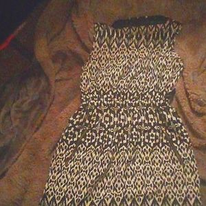 Black & white sleeveless mini dress with zipper pockets